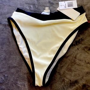 New with tags French style Bikini L bottom. Original retail $99. White/black